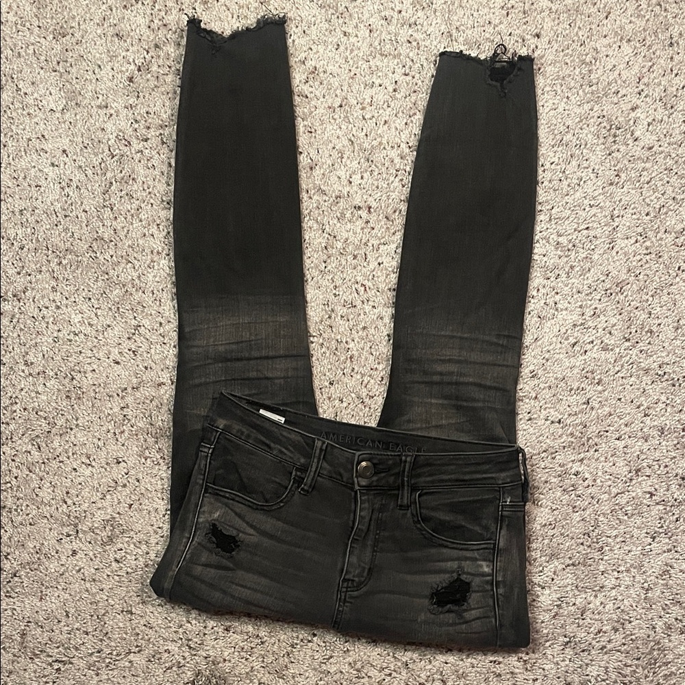 American Eagle Next Level Stretch Black Distressed Jean Size‎ 6